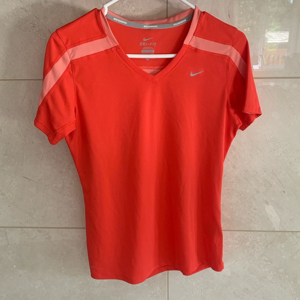 Nike Women's V-Neck Short Sleeve Tee in Coral with Light Pink Accents